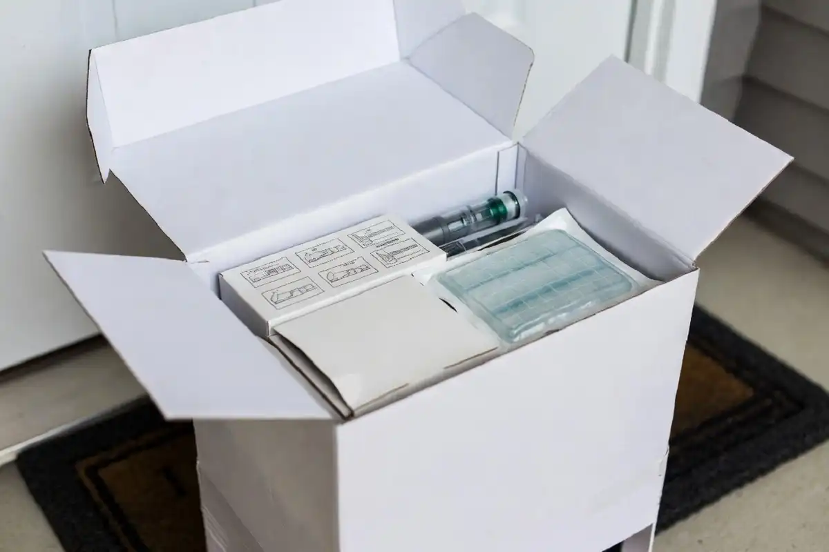 GLP-1 medication package from Amble Health arriving at front door with cold-chain packaging