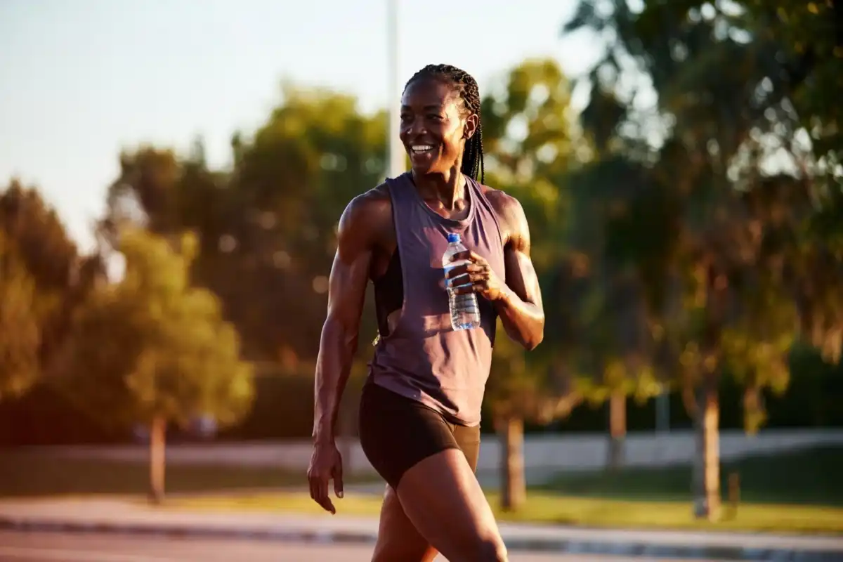 Confident person enjoying healthy lifestyle after Brello Health journey