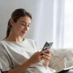 Person using Brello Health telehealth app on smartphone