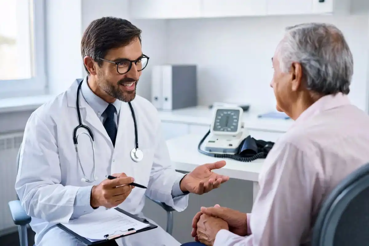 Doctor speaking with patient about early cancer screening