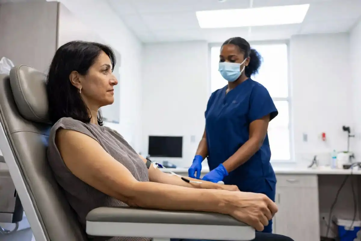 A medical technician drawing blood for a Function Health comprehensive lab panel at a Quest Diagnostics facility