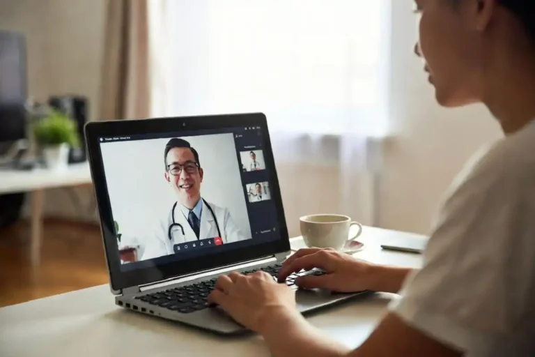 Person having a virtual care consultation through Included Health on a laptop at home