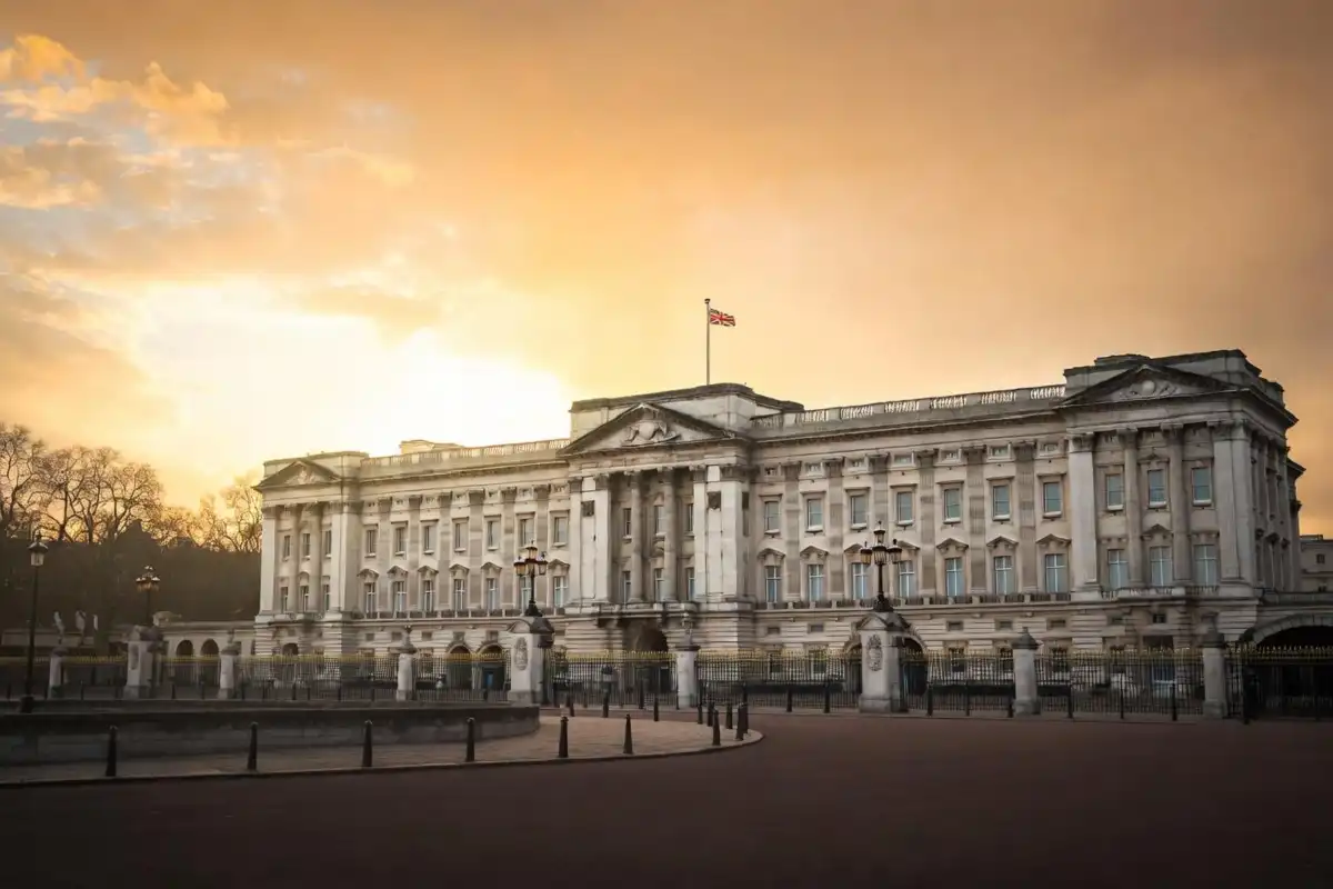 Buckingham Palace at golden sunrise symbolizing royal recovery