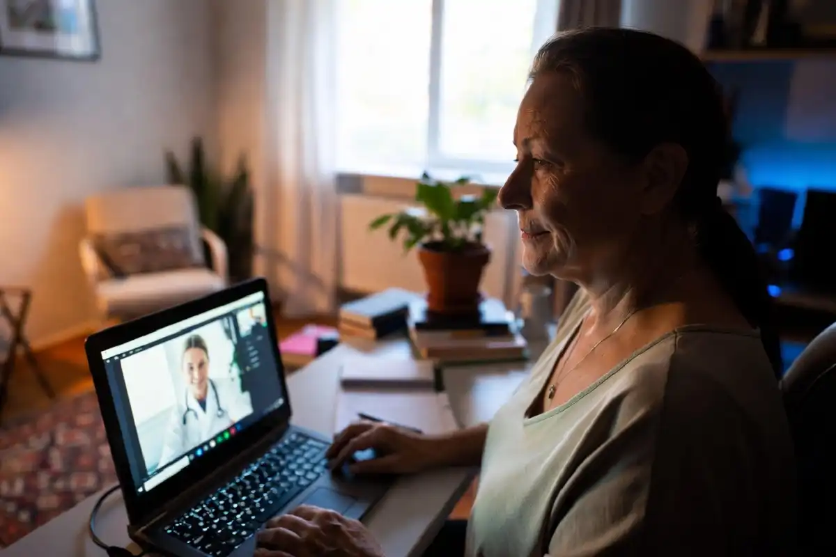 Patient having a telehealth video appointment with a Sutter Health doctor on laptop