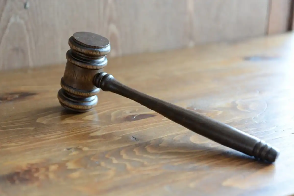 Wooden judge gavel on a desk symbolizing a court sentencing decision